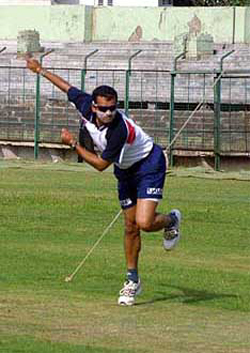 Railways left-arm spinner Murali Kartik practises in the nets at the Nehru Stadium, Pune, on Wednesday, ahead of the three-day tour match