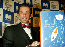 Canada’s Yann Martel poses for photographs after winning the Booker Prize