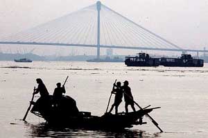 Fishermen return home after day's work