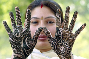 A married woman shows her hands