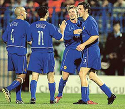 Manchester United's Laurent Blanc celebrates scoring against Olymipiakos Piraeus