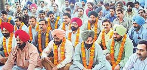 Members of the Telecom Engineering Officers Association hold a rally in support of their demands in Sector 34, Chandigarh