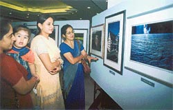 Visitors go around an exhibition of photographs of T.P.S Sandhu and Ranjodh Singh inaugurated at the Satluj Club
