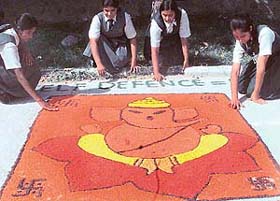 Students participate in a rangoli competition