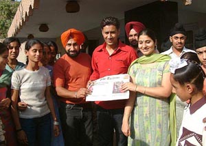 Popular singer-actor Harbhajan Mann poses for a photograph