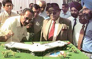 Lieut-Gen J.F.R. Jacob (retd), UT Administrator, looks at the model of the range house
