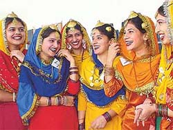 Students wait for their turn to perform giddha at the Panjab University Zonal Youth Festival