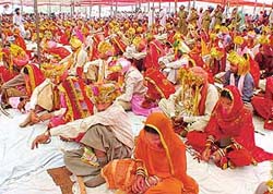 The newly wed couples after a mass marriage function at Pamal village