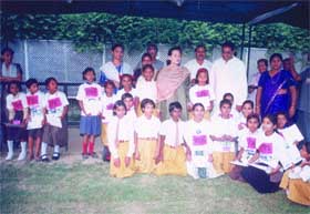 NSCI president Subhash Chopra and winners of the Rajiv Gandhi Marathon Run with Congress president Sonia Gandhi at her residence at 10, Janpath