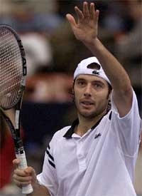 France's Sebastien Grosjean celebrates after beating Russia's Mikhail Youzhny