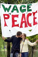 Malcolm Meyer of Athens and Jordan Vincent of Wooster take part in an anti-war rally