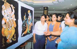 Visitors at a painting exhibition held at the Sutlej Club