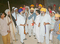 The residents of Sultanwind village begin 'thikri pehra'