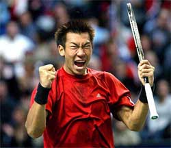 Paradorn Srichaphan of Thailand jubilates after defeating Marcelo Rios of Chile in their final match