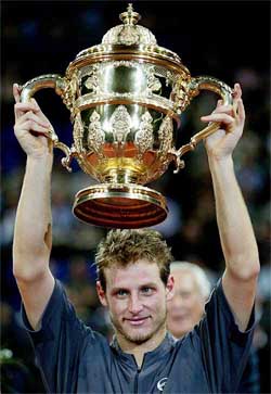 Argentina's David Nalbandian lifts the trophy