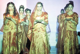 The �Alps Magic 2002� displayed hairstyles over the decades.