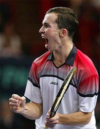 Radek Stepanek of Czech Republic reacts after defeating Gustavo Kuerten