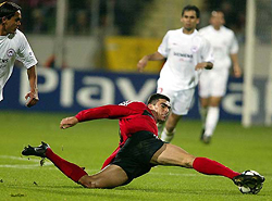 Leverkusen's Lucio of Brazil challenges for the ball