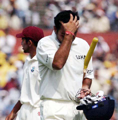 Virender Sehwag curses himself after being dismissed by Mervyn Dillon