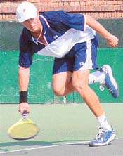 Pavel Ivanov of Russia returns to Juraj Hasko of Slovakia in the semifinals of the ITF Futures Tournament