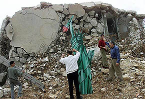 Palestinian artists put a mock Statue of Liberty