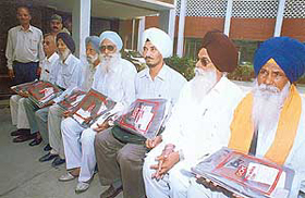 Some of the ex-servicemen who were honoured at the office of the District Sainik Welfare Board by the 152 Gunners Medium Regiment, in Ludhiana on Friday.