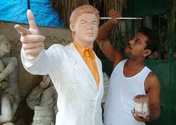 Sculpturist Monti Pal busy finishing a six-foot-tall fibre glass statue