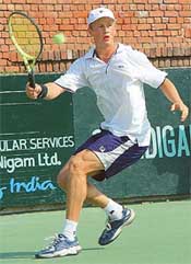 Pavel Ivanov of Russia returns to Harsh Mankad of India in the final of the Chandigarh ITF Futures tournament at CLTA courts, Sector 10