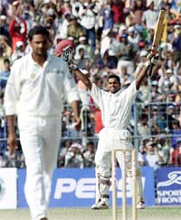 West Indies batsman Shivnarine Chanderpaul acknowledges his century