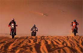 Bike riders Grant Robertson from Australia, Stefano Candida from Italy and Ali al Shanfari from the UAE