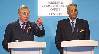 Britain's Foreign Secretary Jack Straw points to a journalist