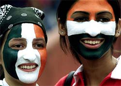 Indian cricket fans with painted faces