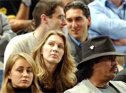 Former German tennis ace Steffi Graf and wife of US tennis star Andre Agassi, sits in the stands of Bercy stadium to watch her husband play his quarterfinal match