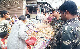 Army personnel purchase fire crackers