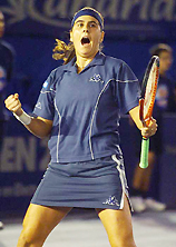 Conchita Martinez of Spain celebrates after beating Janette Hussarrova of the Slovak Republic