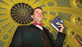 Yann Martel holds a copy of his book Life of Pi after winning the Booker Prize for Fiction in London