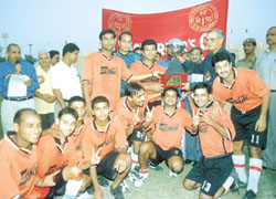 Lt-Governor Vijai Kapoor presenting the Lt-Governor�s Football Trophy to the Shahdara Club at the Ambedkar Stadium 