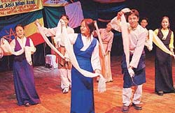 Tibetan students give a dance performance during the cultural show at Tagore Theatre in Sector 18, Chandigarh on Monday.