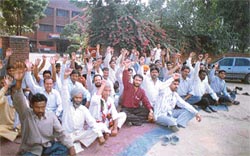 Members of the family of the kidnapped child, Honey, stage a dharna outside the Focal Point police station 