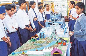 Students of city schools have a look at models on display at the annual state science exhibition in the State Institute of Education, Sector 32, Chandigarh