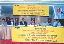 Participants at a seminar on insurance