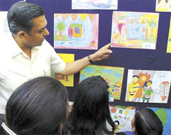 Police Commissioner R.S. Gupta at a painting exhibition of child victims of crime