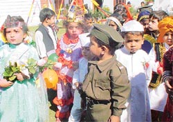Tiny tots of Small Wonder Nursery School wait for their turn at a fancy-dress competition in Ludhiana