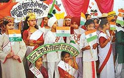 Schoolchildren symbolise unity in diversity at an exhibition in Sacred Heart School, Sector 26, Chandigarh, on Friday.