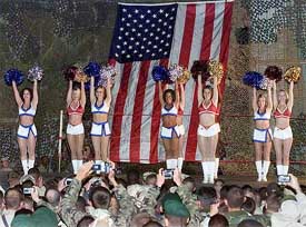 Cheerleaders from the NBA basketball team, Washington Wizards, entertain American soldiers