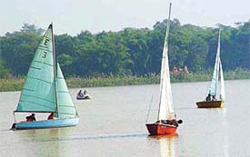 Enterprise-class boats take part in a race