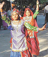 Traditional dancers performing at the Crafts Fair, a part of the trade fair at Pragati Maidan