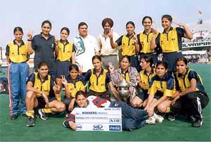 The members of the Northern Railway team pose with the trophy