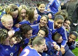 Players of the French women's soccer team jubilate after winning