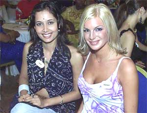 Miss India and Miss Denmark at a gala dinner 